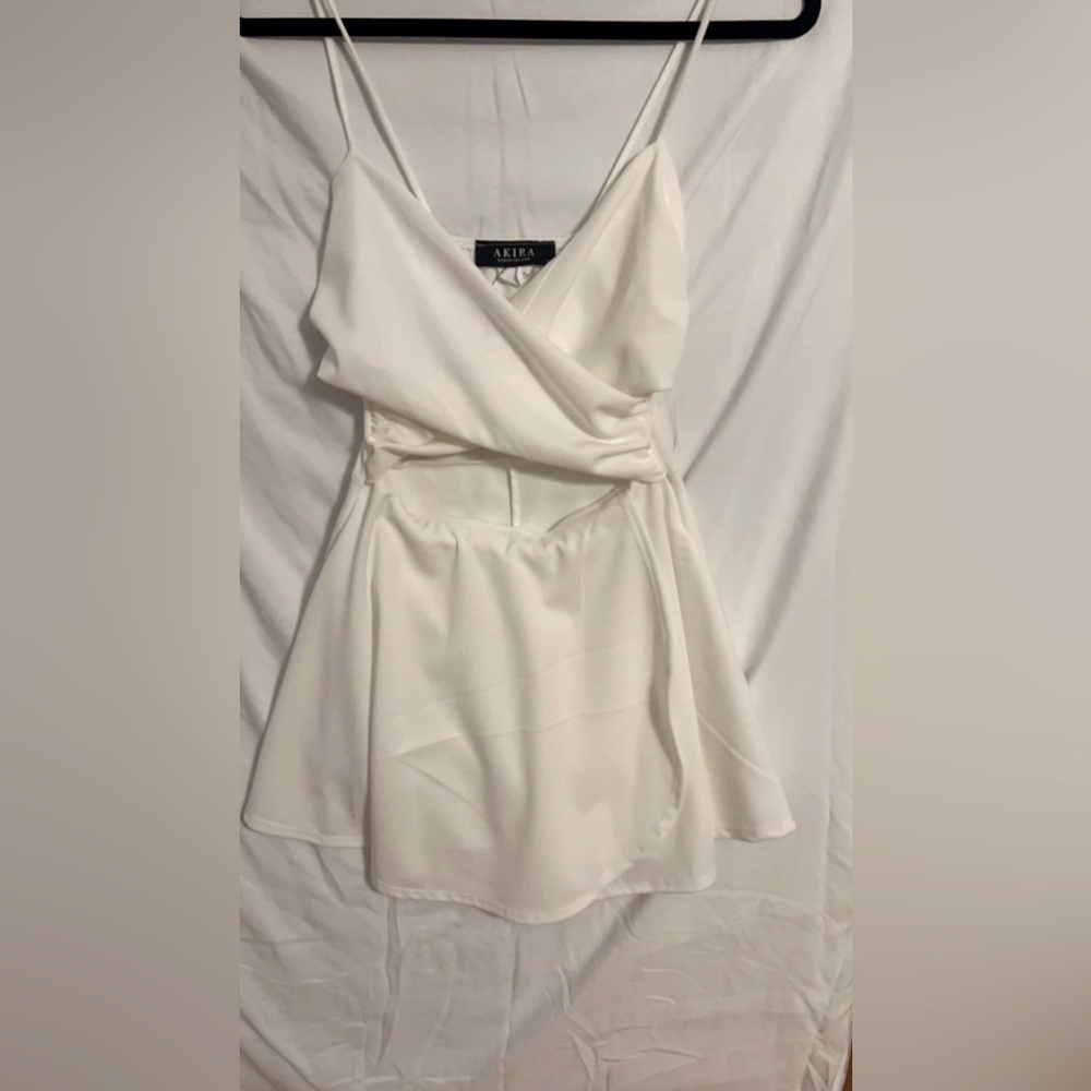 Beautiful white Akira dress. Size small, medium stretch